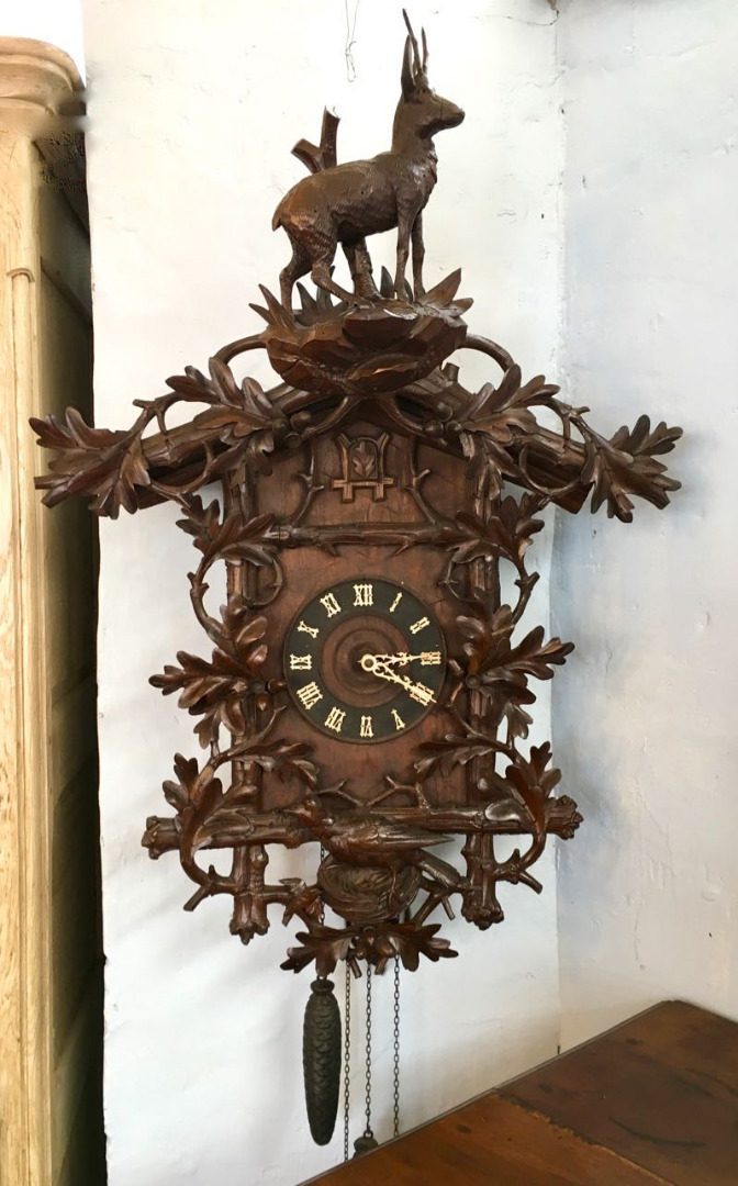 Horloge coucou brun Horloge coucou brun